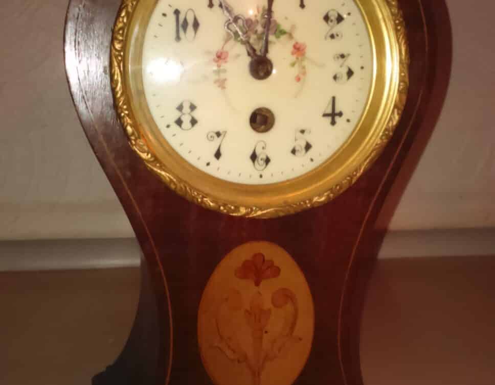 Estimation Montre, horloge: Horloge bois de rose