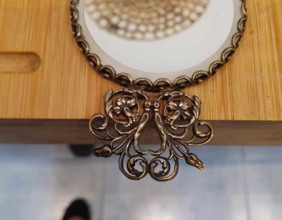 Estimation Bijoux: vieux miroir de sac a main