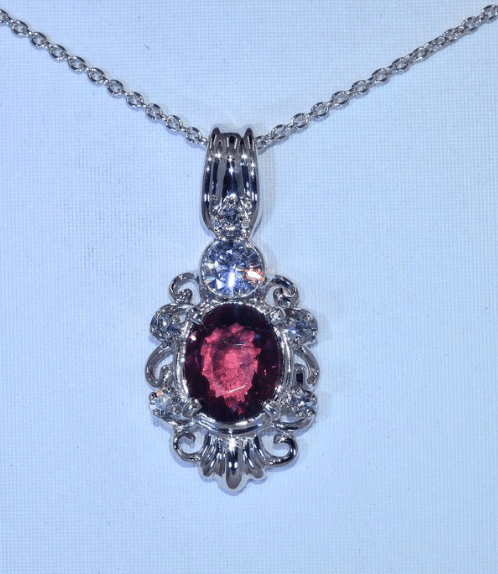 Estimation Bijoux: collier or blanc en diamant et tourmaline rose