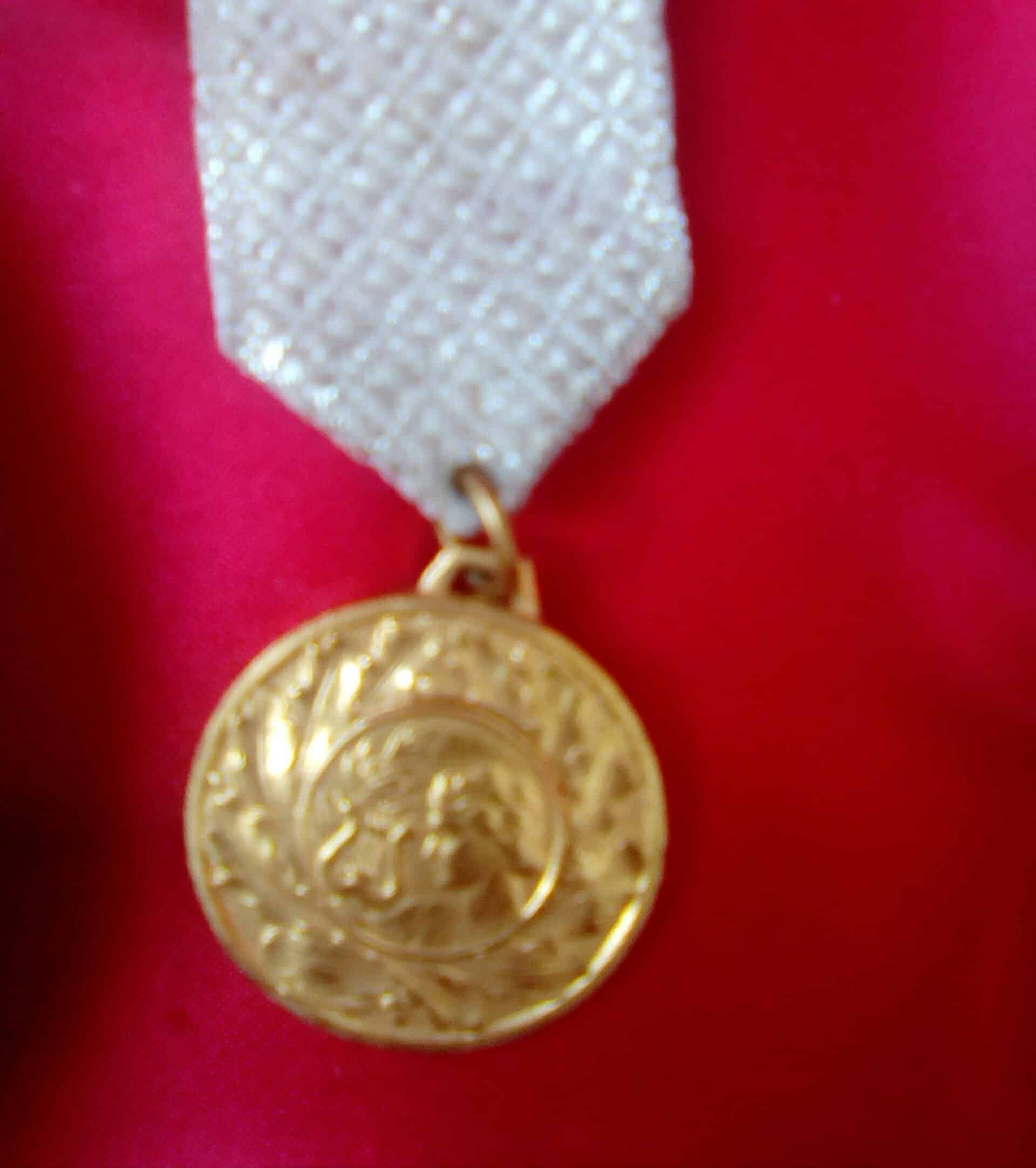 Medaille couleur or uniface