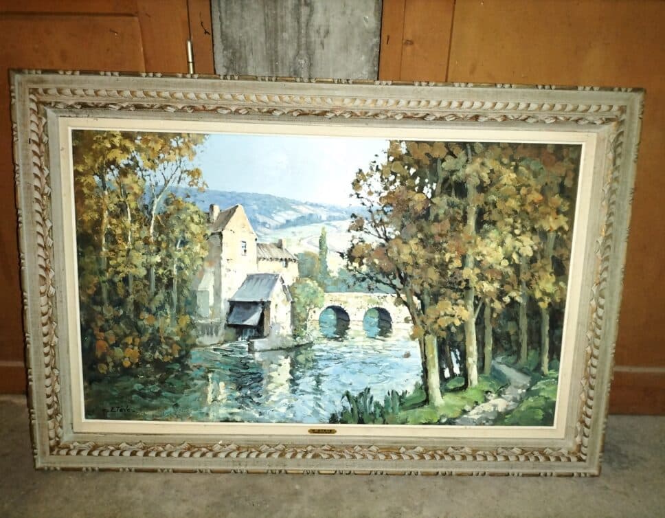 Estimation d’une Peinture de Rivière et Moulin à Eau en Forêt par Raoul Eteve (1902-1967) encadrée dans un Bois Relief.