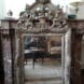 Estimation miroir ancien style Regence avec fronton en bois argenté – 18e siècle